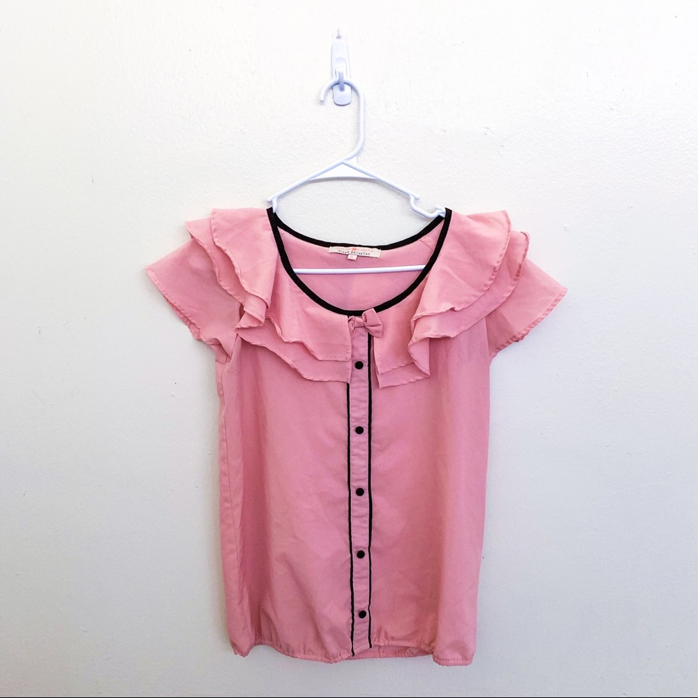 Pink blouse with ruffles